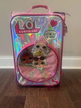 L.O.L. Surprise! Holographic Pink Character Rolling Suitcase—no longer in stores